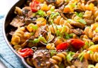 طريقه عمل المكرونه الحمرا بالفطر والخضار