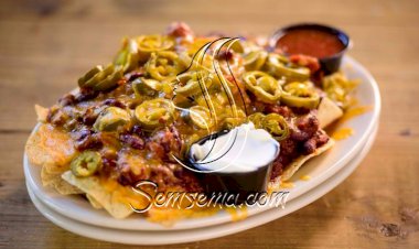 طريقة عمل بيتزا التورتيلا بالسجق والفلفل الحار