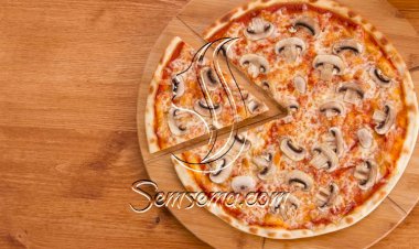 طريقة عمل بيتزا المشروم بالموزاريلا