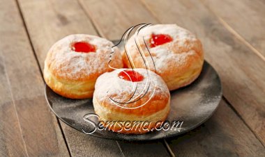 الدونات اللذيذ بالمربى والسكر.. قدميه لأطفالك