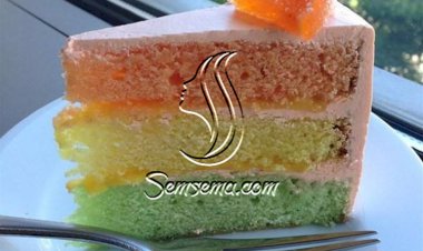 طريقة عمل كيك قوس قزح بكريمة البرتقال