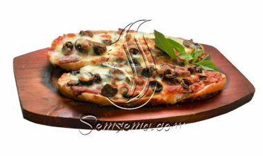 طريقة عمل قوارب البيتزا باللحمة المفرومة