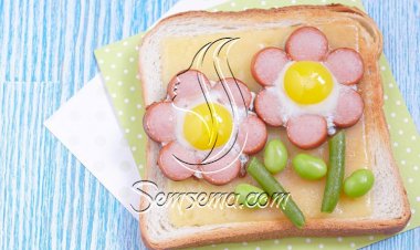 طريقة عمل وردات السوسيس بالبيض للأطفال