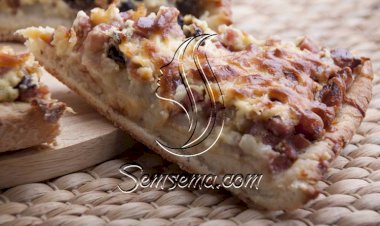 طريقة عمل صينية البطاطس بالمشروم والسجق