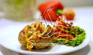 طريقة عمل بطاطس مشوية باللحم والجبن