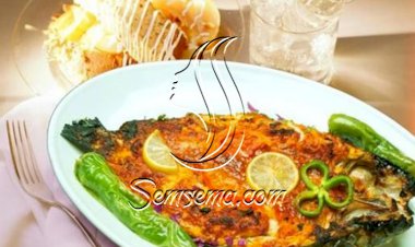 قدّمي السمك المتبّل مع رز الصيّادية