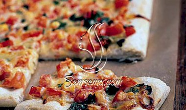 بيتزا الثوم والطماطم والريحان المشوية.. من المطبخ الإيطالي