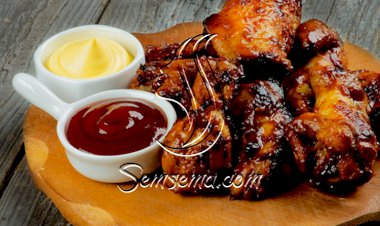 أجنحة الدجاج بصوص الترياكي