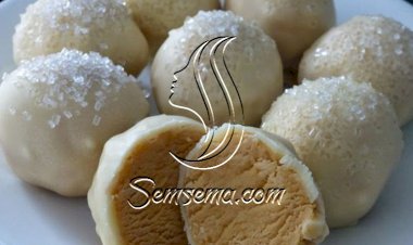 كرات زبدة الفول السوداني بتغليفة الشوكولاتة البيضاء