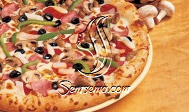 طريقة عمل عجينة بيتزا دومينوز