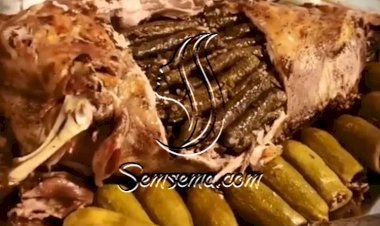 طريقة عمل خروف محشي بورق العنب و الكوسا