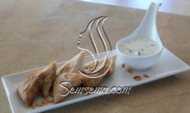 دجاج مسخّن بخبز المرقوق