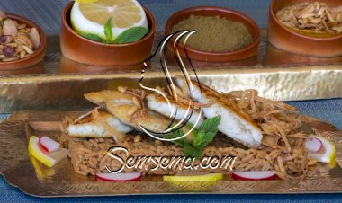 صيّادية سمك مع صلصة الطاجن