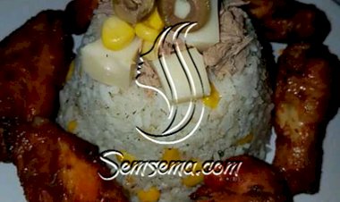 أرز بالذرة والتونة مع أفخاذ الدجاج