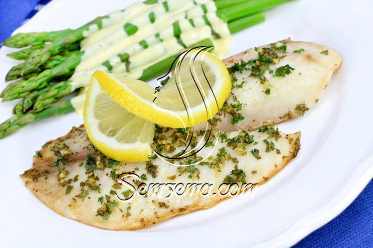 طريقة عمل السمك بالليمون والبقدونس