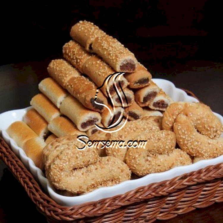طريقة عمل اصابع التمر بالسمسم منال العالم